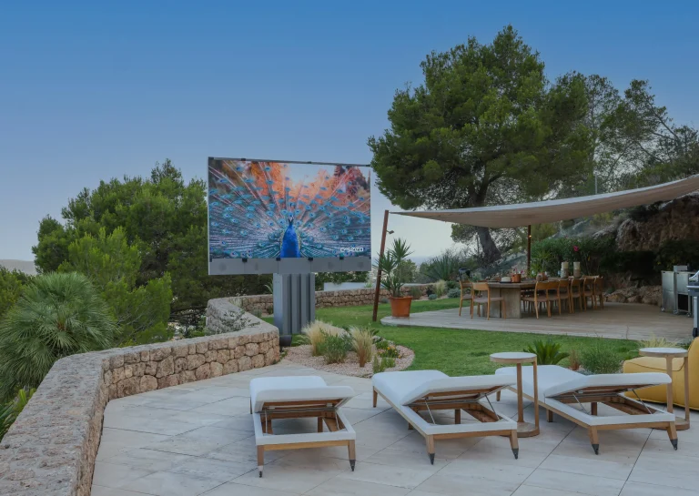 'Luxury outdoor living space with integrated garden audio and outdoor TV, UK | CSEED OUTDOOR FOLDING TV